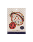 Puffy sticker fun packaging with a ladybug design on a white background