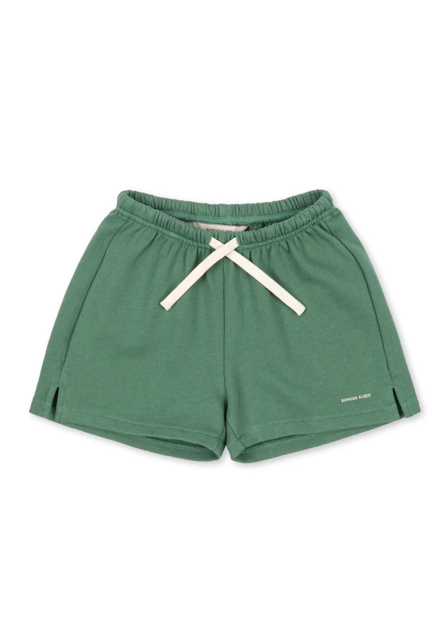 Green shorts with a white drawstring on a white background