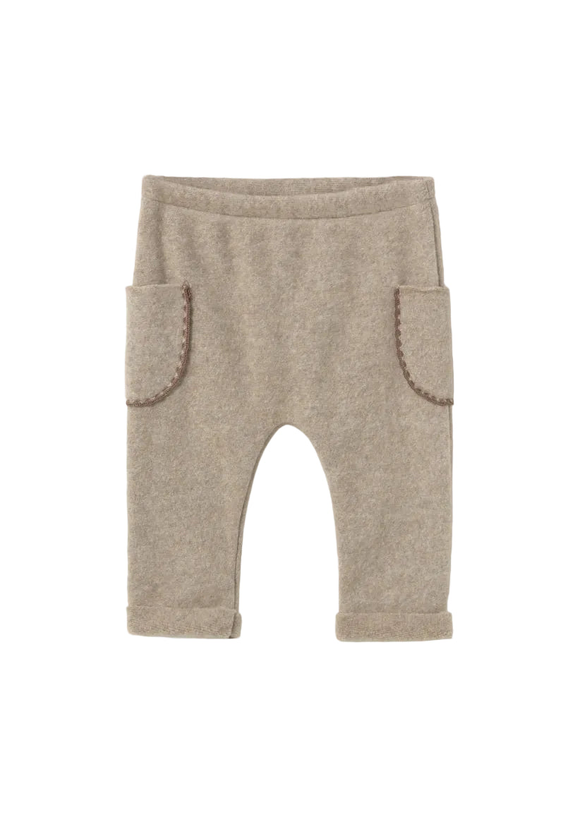 Beige baby pants on a white background