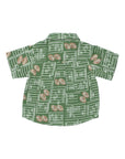 A short-sleeve button-up shirt with a green and white football field pattern, featuring brown and white footballs printed throughout.