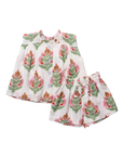 Floral patterned shorts on a white background