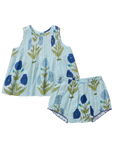 Children's sleeveless top and shorts set with floral pattern on a white background