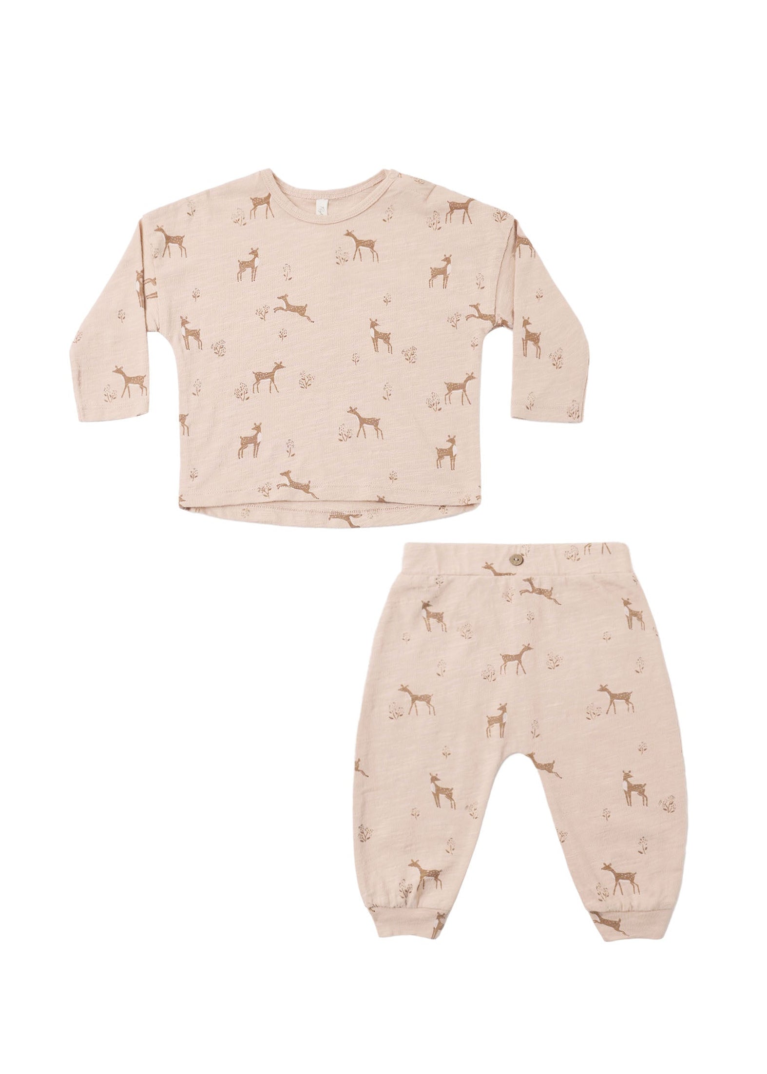 A two-piece children's pajama set featuring a long-sleeve top and matching pants in a light beige color with an all-over brown deer print, displayed on a solid white background.