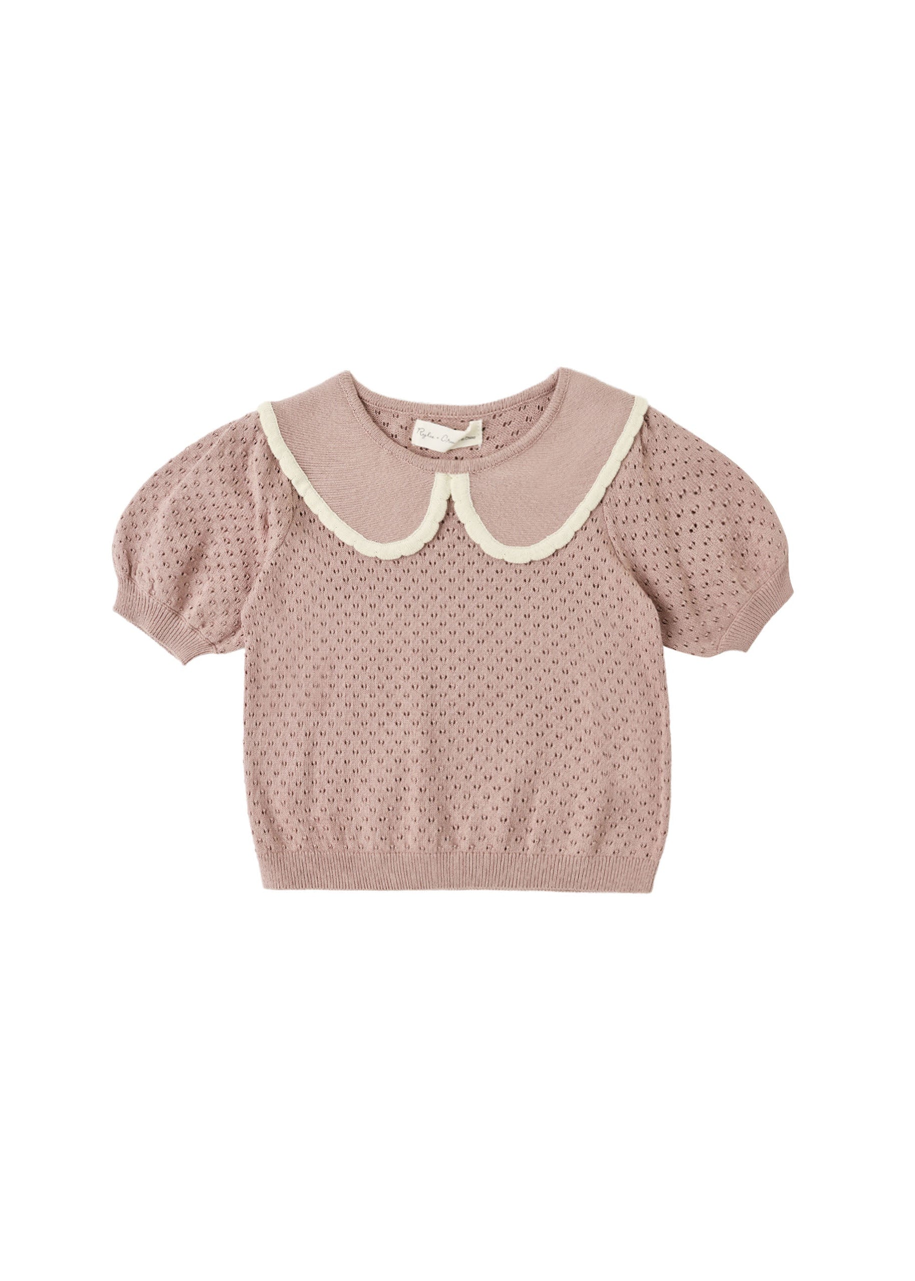 A baby knit top in dusty rose pink with a textured micro-dot pattern, featuring a cream-colored Peter Pan collar and short puff sleeves, shown against a plain white background.