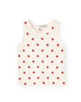 White sleeveless top with red star pattern on a white background