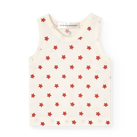 White sleeveless top with red star pattern on a white background