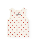 White sleeveless top with red star pattern on a white background