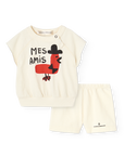 Children's outfit with a t-shirt and shorts on a white background