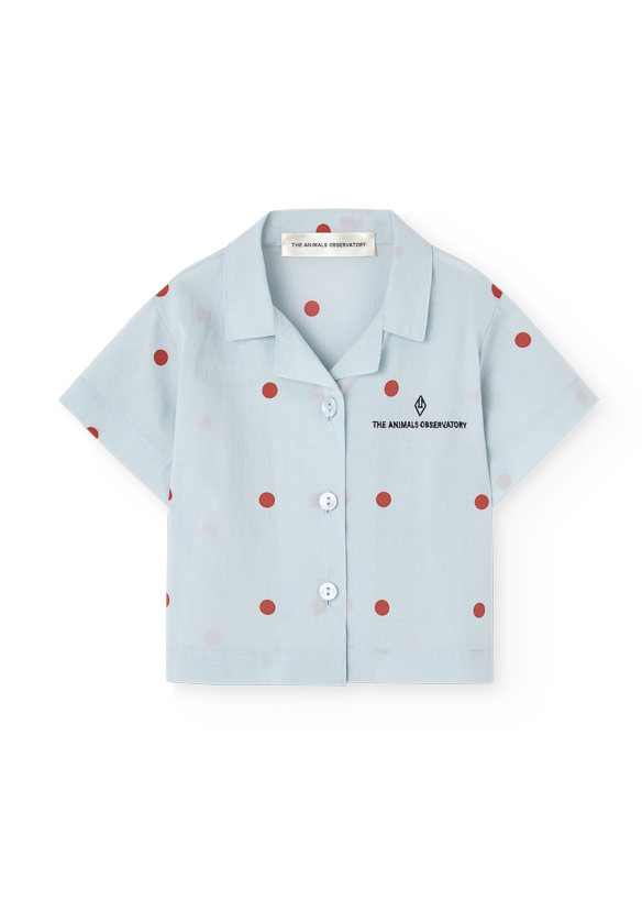 Light blue shirt with red polka dots on a white background