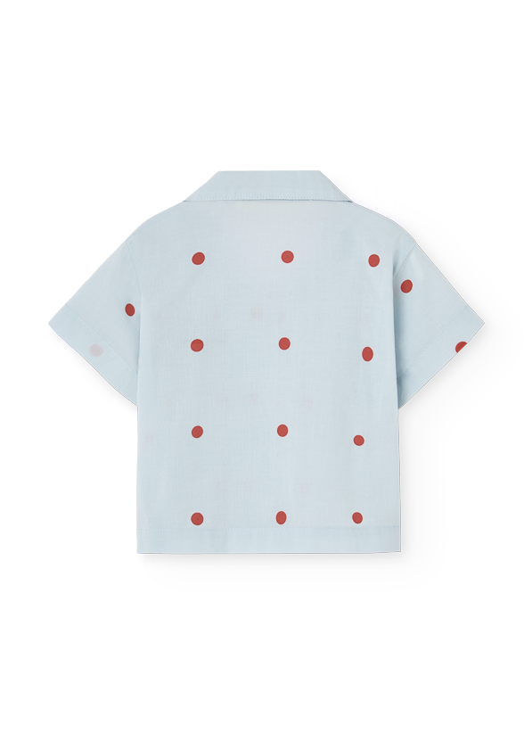 Light blue shirt with red polka dots on a white background