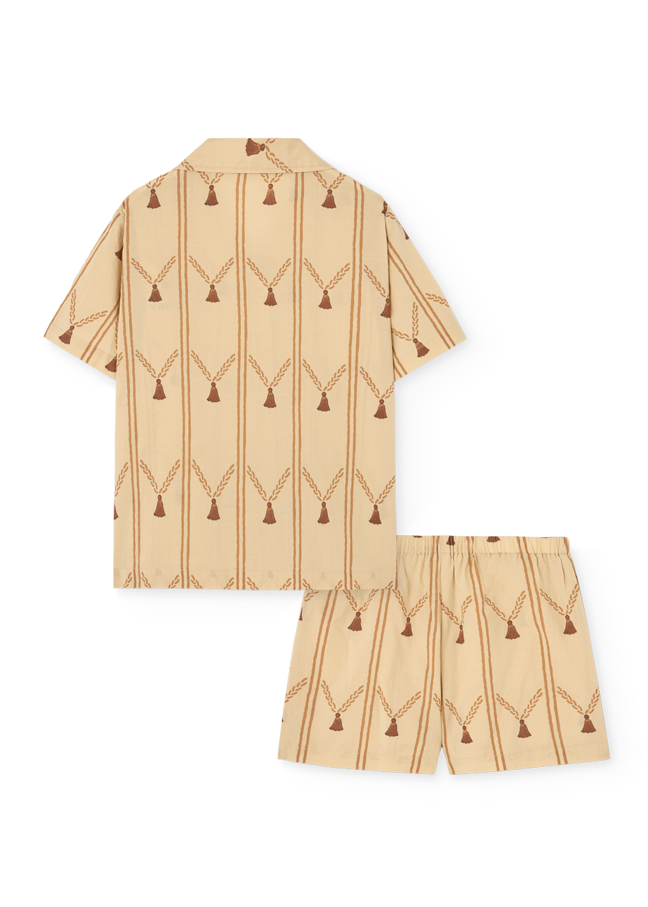 Beige shirt and shorts set with geometric pattern on a white background