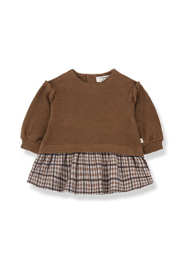 Brown sweater with plaid skirt on a white background