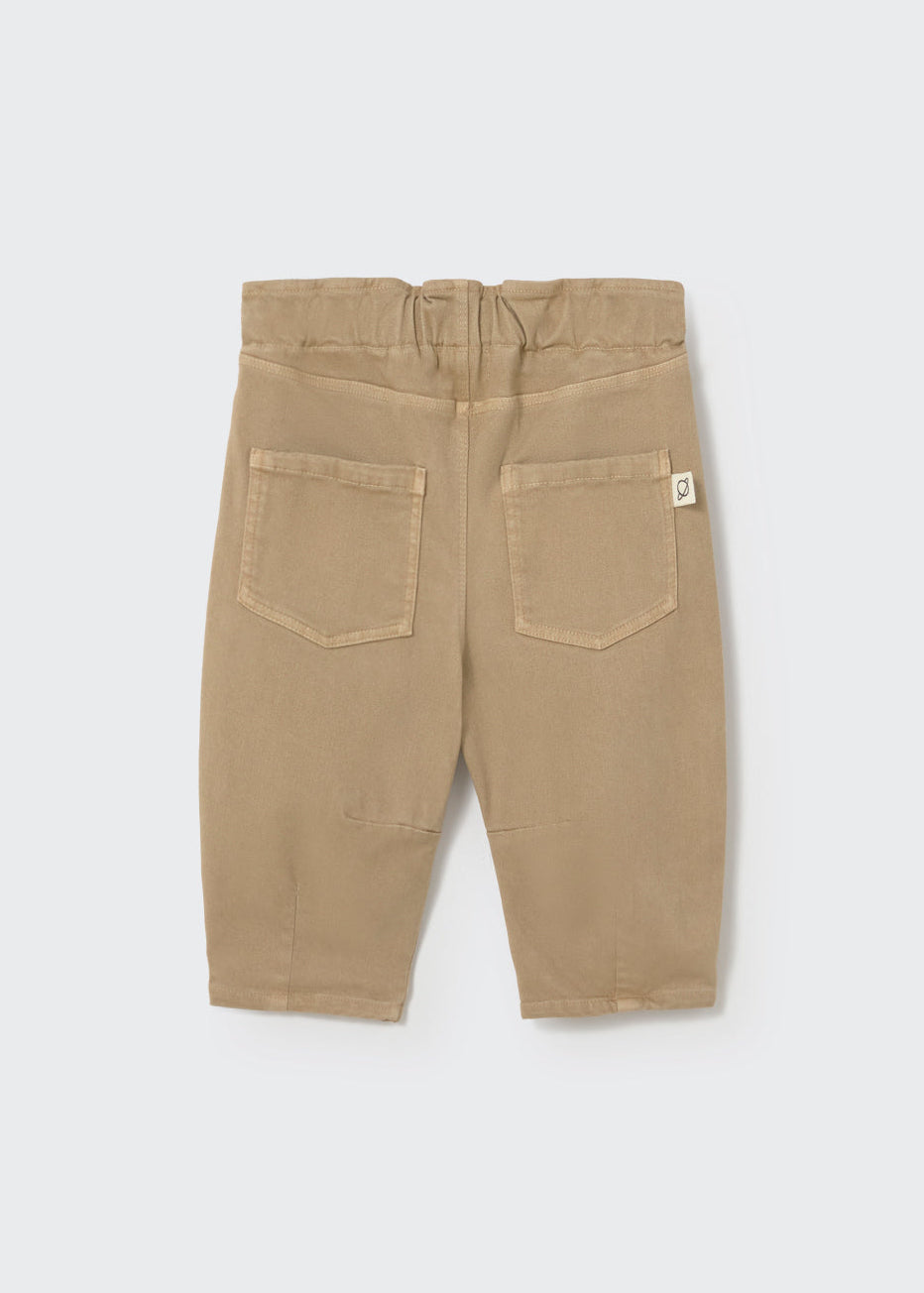 Beige pants on a white background