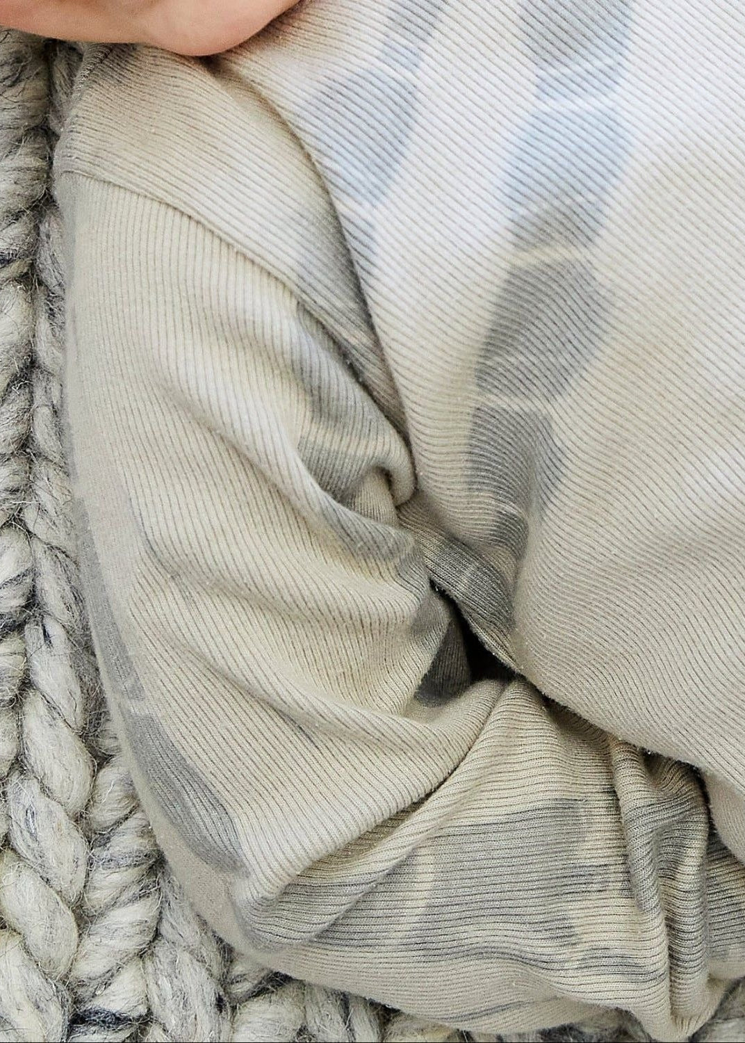 Close-up of a textured fabric with a pattern on a woven surface