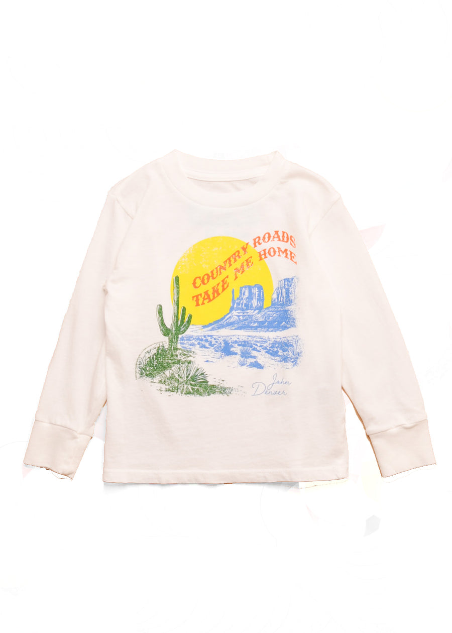 Ecru long sleeve shirt with a graphic design on the back featuring a desert scene and text.
