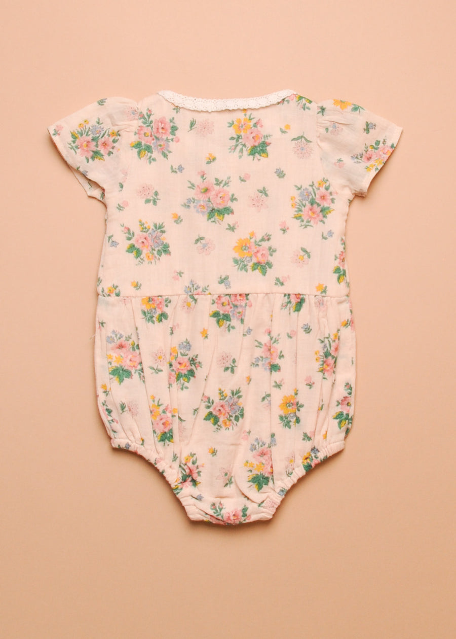 FLORAL SMOCKED ONESIE
