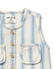 Baby vest with blue and white stripes and wooden buttons on a white background