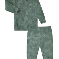 Green pajama set with long-sleeve top and pants on a white background