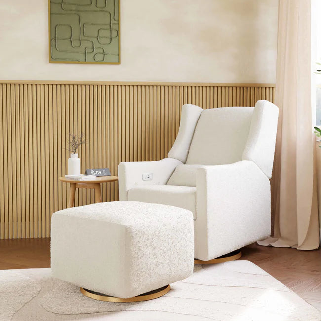 White armchair with ottoman in a modern living room setting