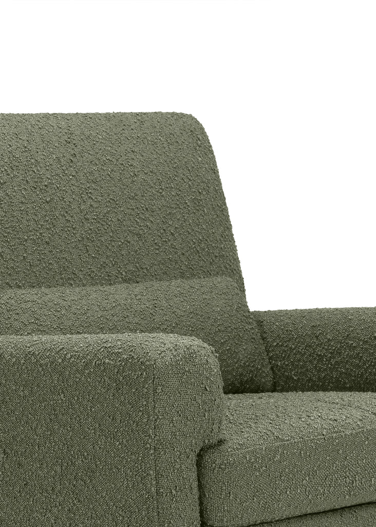 Green textured sofa on a white background