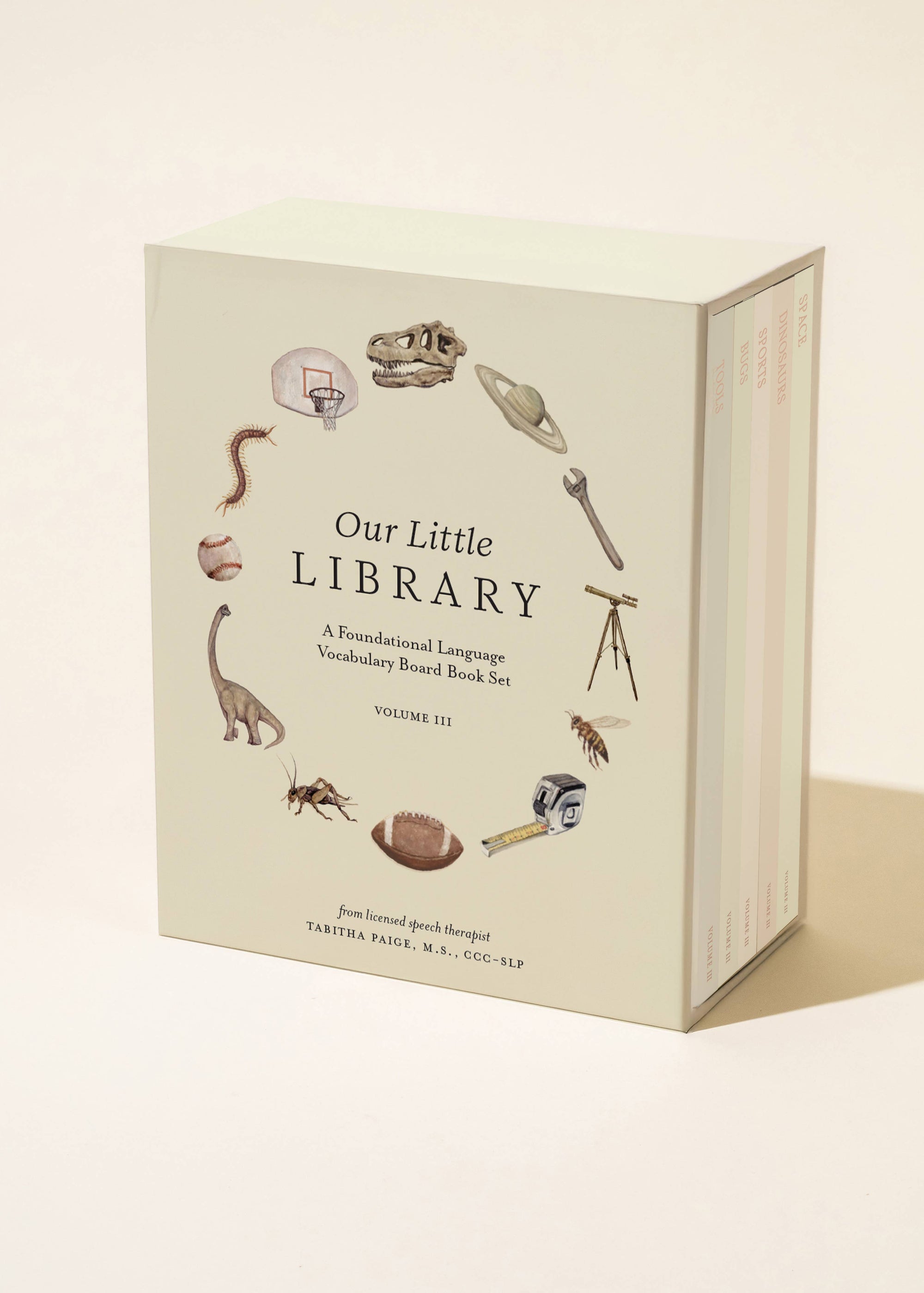 Book titled 'Our Little Library' with illustrations on a beige background