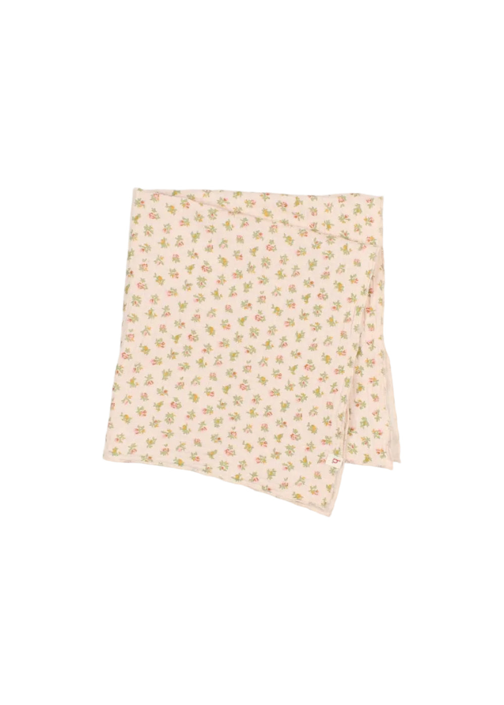 A folded light pink fabric item, likely a blanket or quilt, featuring a dense all-over floral print in soft green, yellow, and pink, set against a plain light gray background.