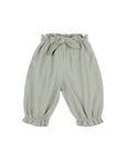 A pair of baby bloomers in a muted sage green fabric, featuring an elastic waistband with a matching fabric bow, elasticized leg cuffs, and a side zipper, shown against a plain light gray background.
