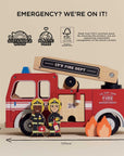 Wooden toy fire truck with firefighters and flames, featuring sustainability logos and dimensions.