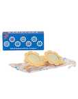 Children's yellow sunglasses with floral design on a white background, featuring the Babiators brand.