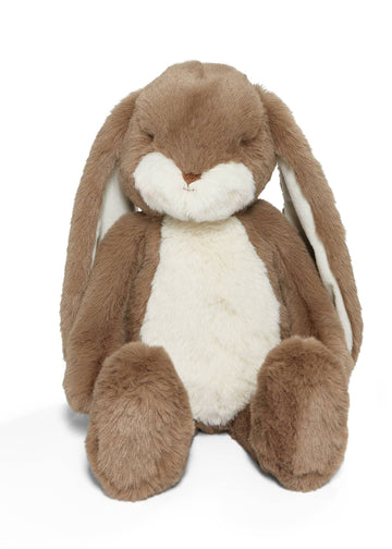 Plush toy rabbit with brown fur and white belly on a white background