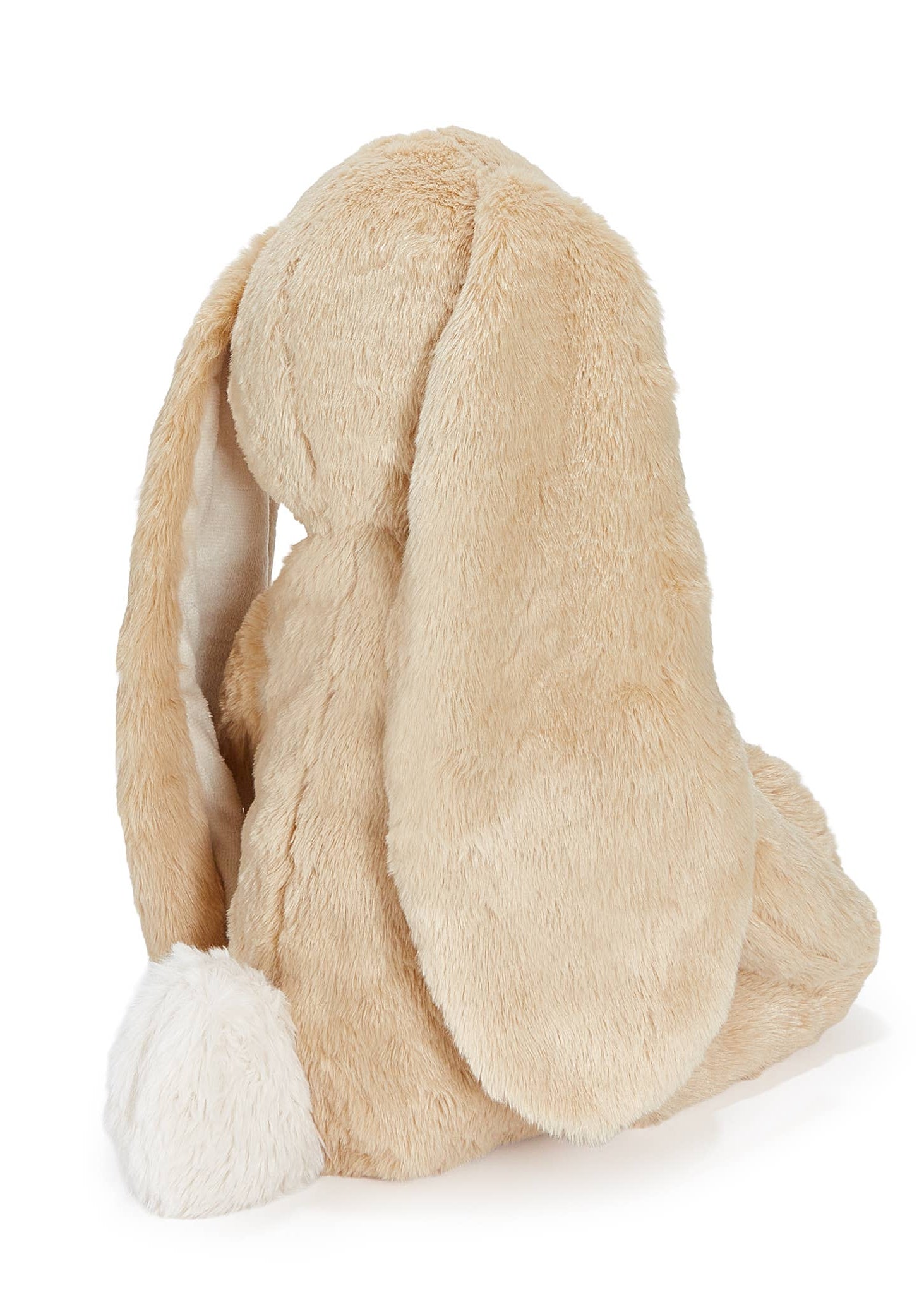 Beige plush bunny hat on a white background