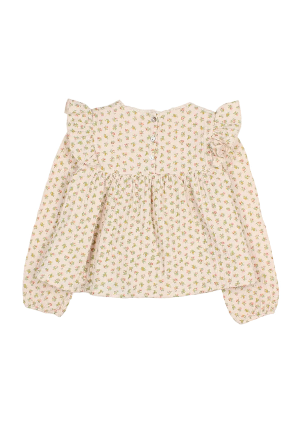 A baby girl's long-sleeve blouse with a delicate, all-over small floral print in soft green and orange on a warm cream background. The top features ruffled shoulder details, a gathered waist, and a small fabric flower applique on the upper right shoulder, presented flat on a light gray background.