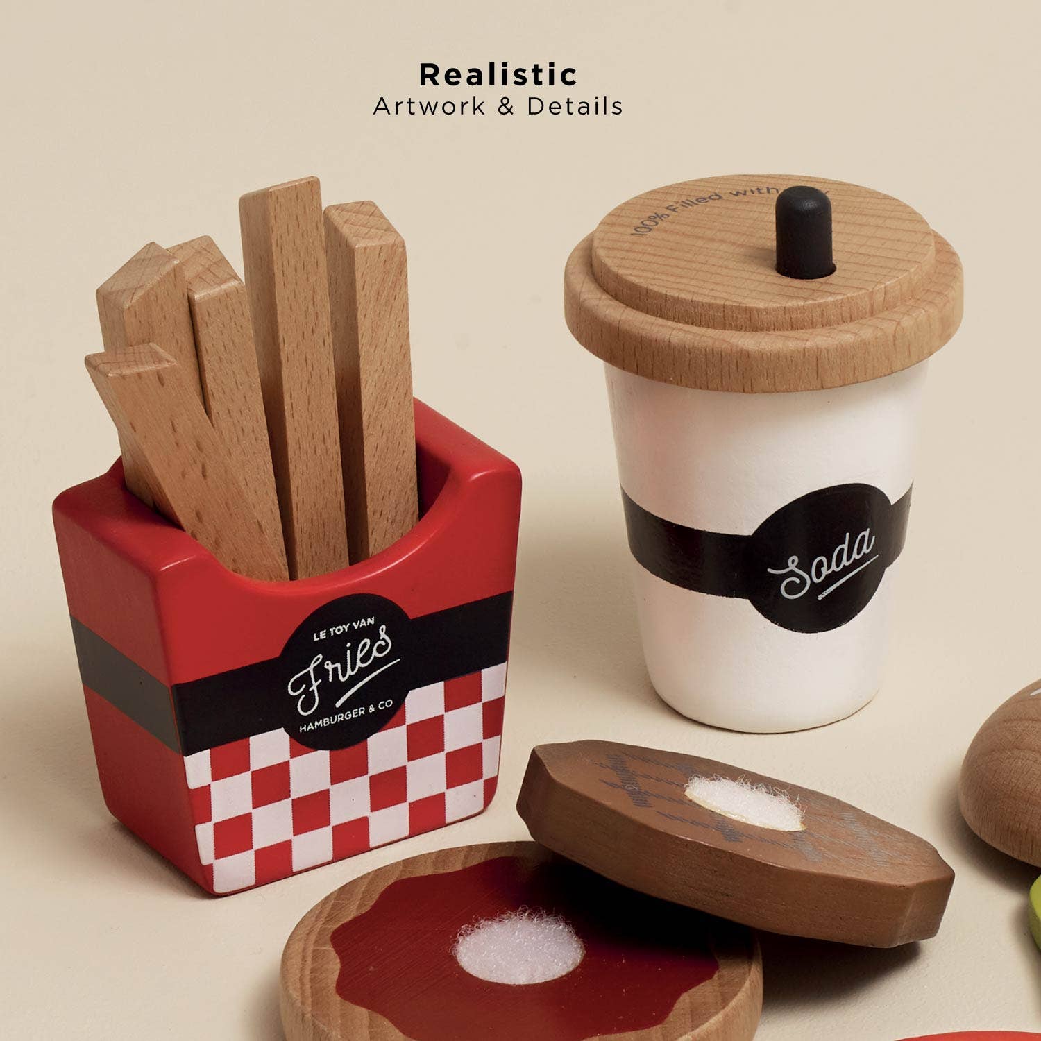 Set of wooden food props including fries, a cup with a lid, and saltshakers on a beige background.