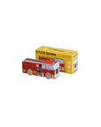 Red toy fire truck in front of its yellow packaging box labeled 'GT270 Quinn' on a beige background.