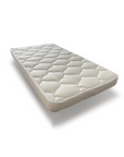 White quilted mattress on a white background