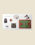 Illustrated book page about basketball with various elements on a beige background