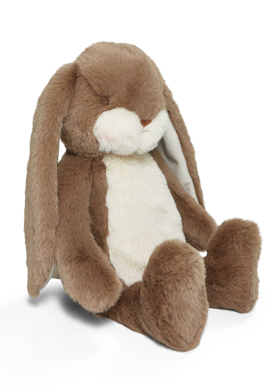 Brown plush bunny toy on a white background