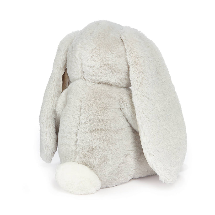 Plush toy rabbit with long ears on a white background