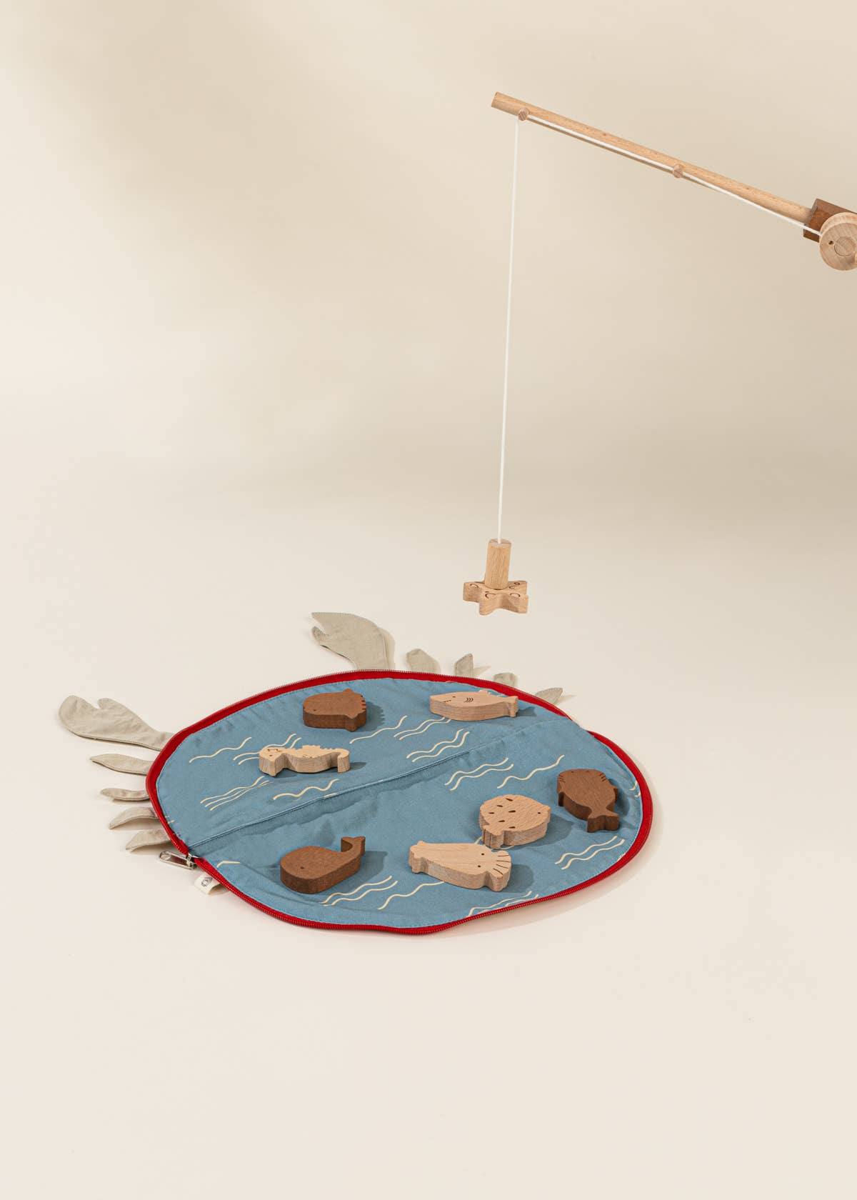 WOODEN FISHING GAME IN CRAB BAG