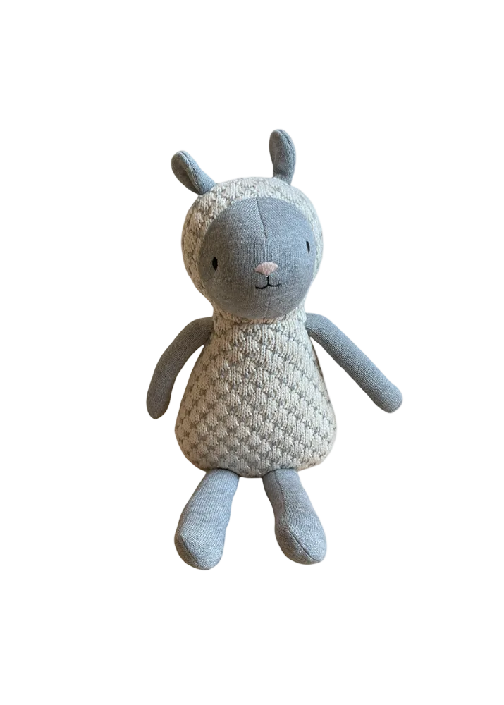 A handmade plush toy sheep made from textured knit fabric in light gray and cream, shown against a plain white background.