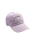 Purple cap with 'LITTLE SIS' text on a white background