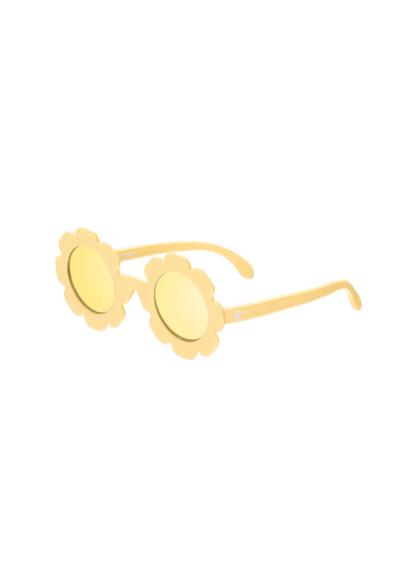 Yellow sunglasses with floral designs on a white background