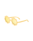 Yellow sunglasses with floral designs on a white background
