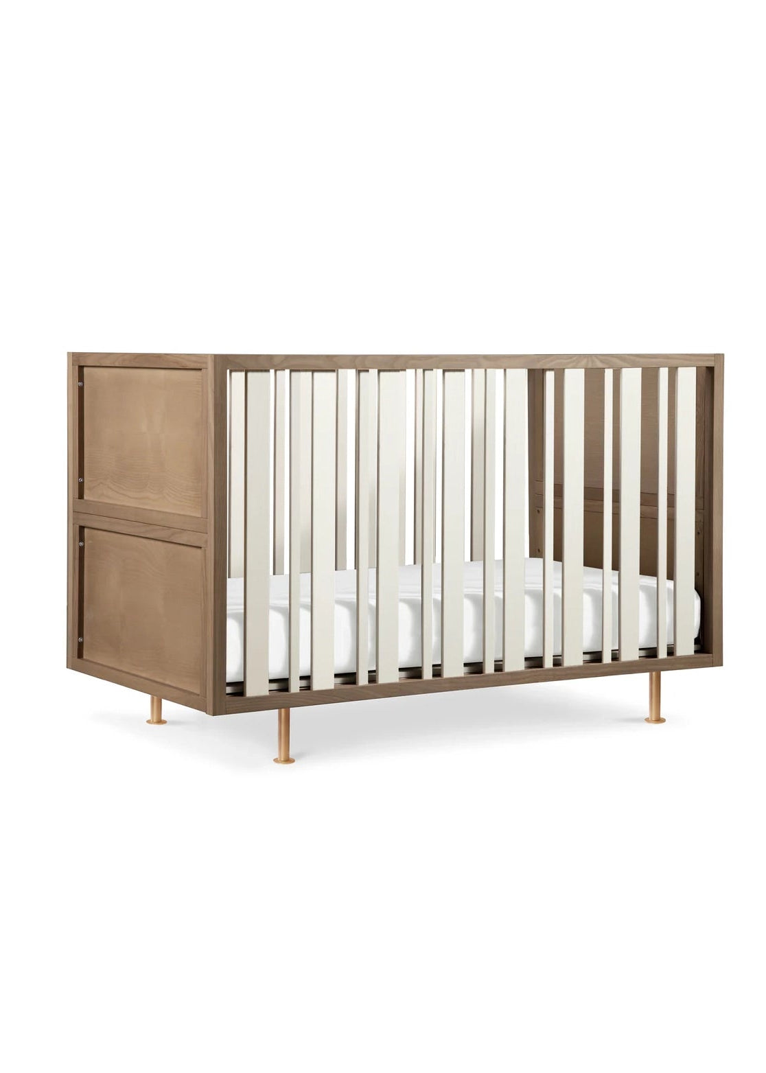 Wooden crib with white bedding on a white background