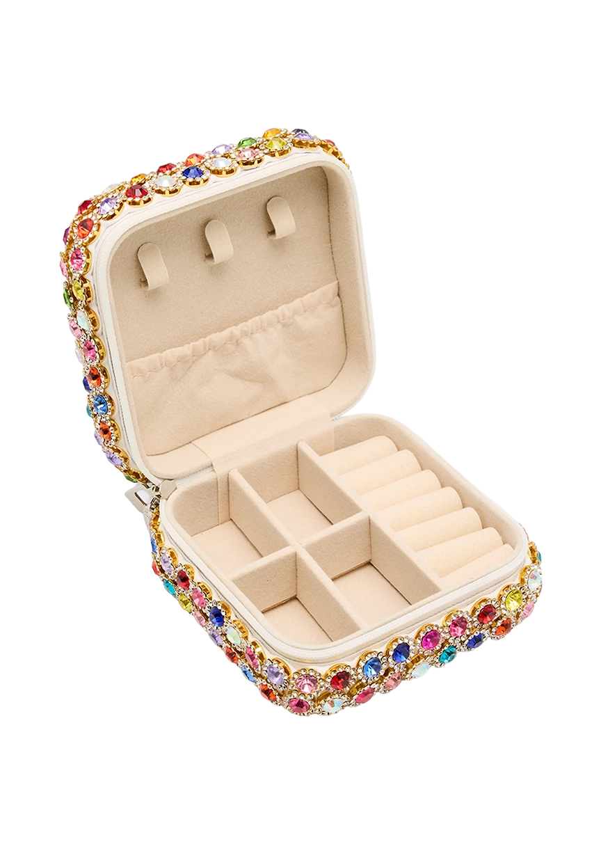 Jewelry box with colorful gemstone accents on a white background