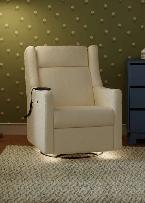 Beige recliner chair in a room with green wallpaper and a blue dresser.