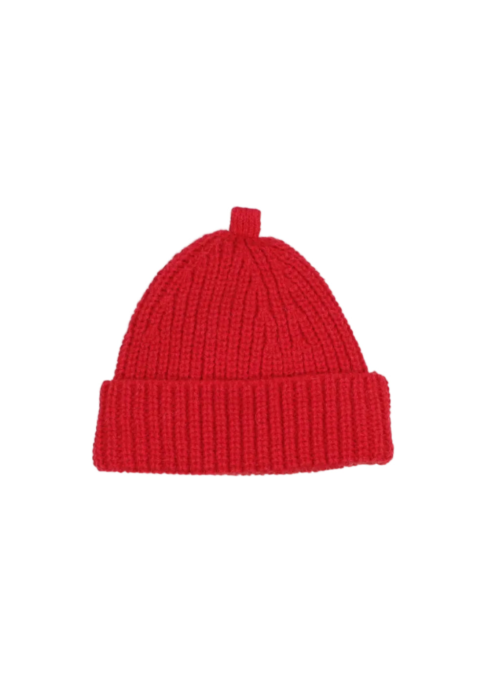 A bright red ribbed knit beanie hat with a folded cuff and a small top loop, photographed flat against a light gray background.