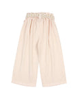 Light pink wide-leg cropped pants with a gathered elastic waistband featuring a small floral pattern, shown flat on a light gray background.
