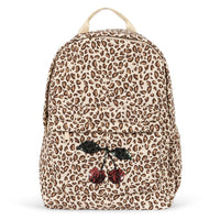 Leopard print backpack with a face design on a white background
