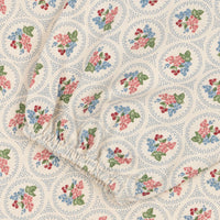 Floral patterned fabric with a white background